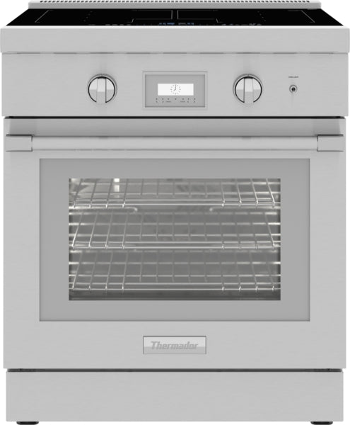 Stainless steel induction professional range with digital display, control knobs, and spacious oven interior in kitchen appliances collection