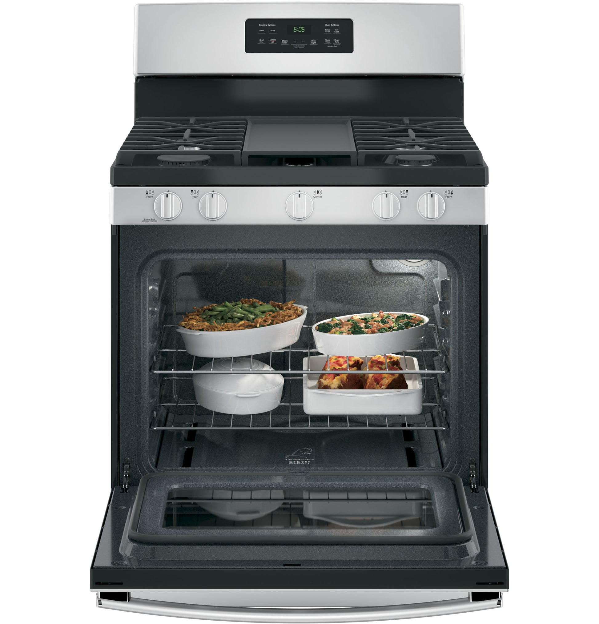 Free-standing gas range with four burners and open oven door showing multiple casseroles baking inside interior light on