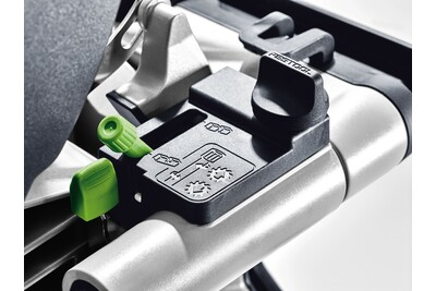Close-up of adjustment controls on a Festool cordless compound miter saw in a woodworking power tools setting
