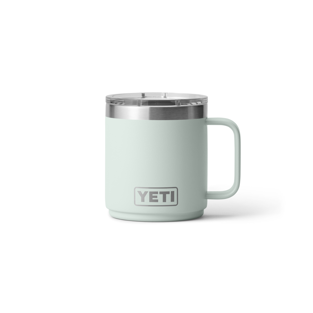 Light green stackable mug with ceramic lining and clear lid for hot and cold beverages in drinkware collection