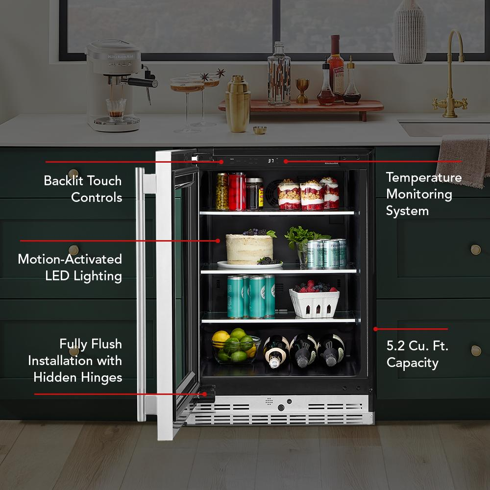24-inch undercounter refrigerator with glass door, metallic shelves, motion-activated LED, and temperature control in kitchen