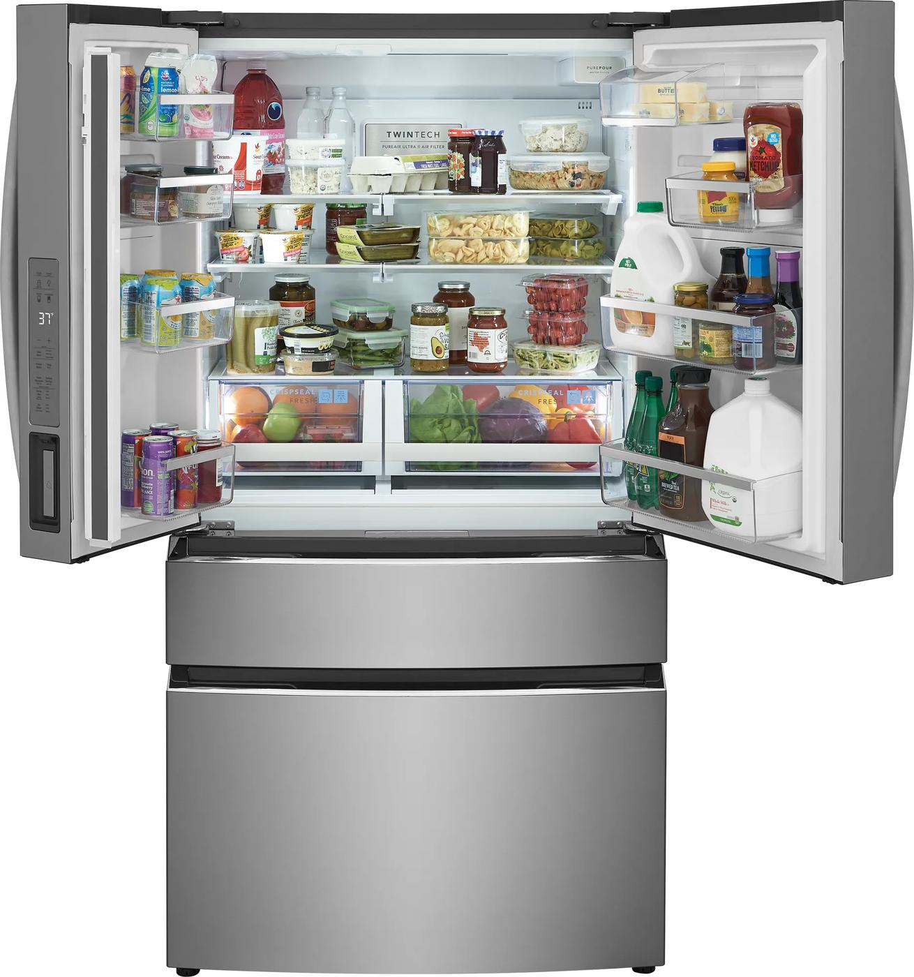 Stainless steel 4-door French door refrigerator with two lower freezer drawers in kitchen appliances collection