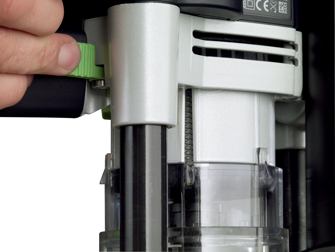 Close-up of hand adjusting green control knob on Festool 576223 OF 2200 EB-F-Plus Router from woodworking tools collection