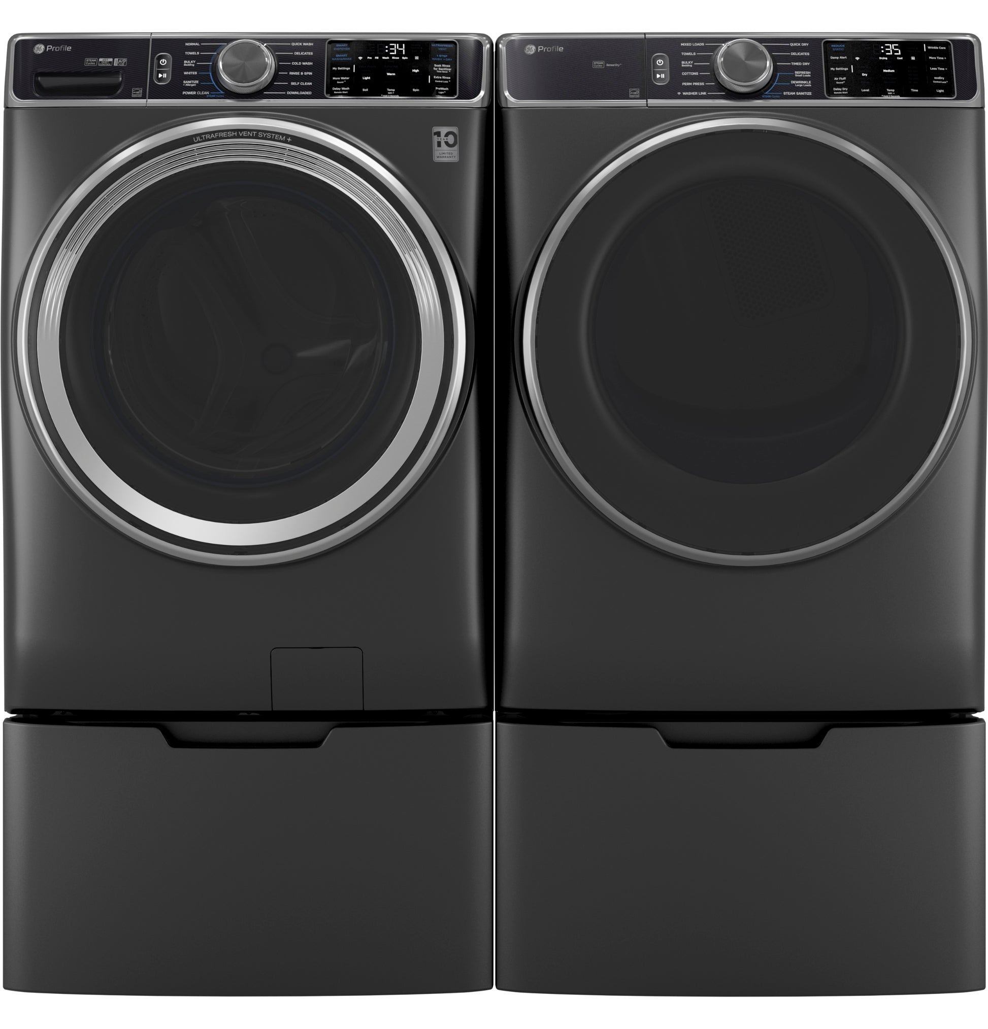 Pair of dark gray front-load washer and dryer with digital controls on matching laundry pedestals in appliance parts collection