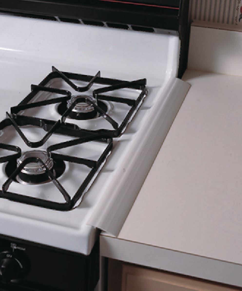 White fire-retardant gap protector bridging stove and countertop, kitchen gadget for spill prevention under $50 collections