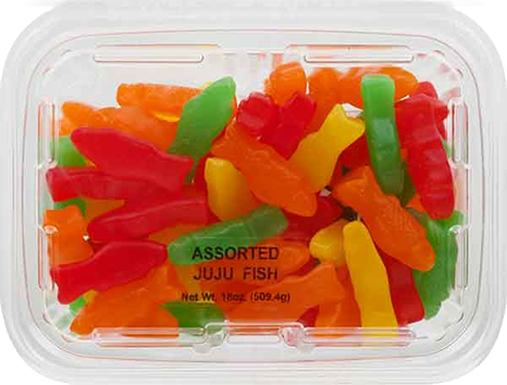 Clear plastic container filled with colorful assorted fruit-flavored gummy fish candy in bright red, orange, yellow, and green colors