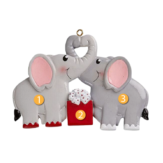 Gray elephant couple ornament with pink ears holding red gift box for Christmas under $50 decor collection