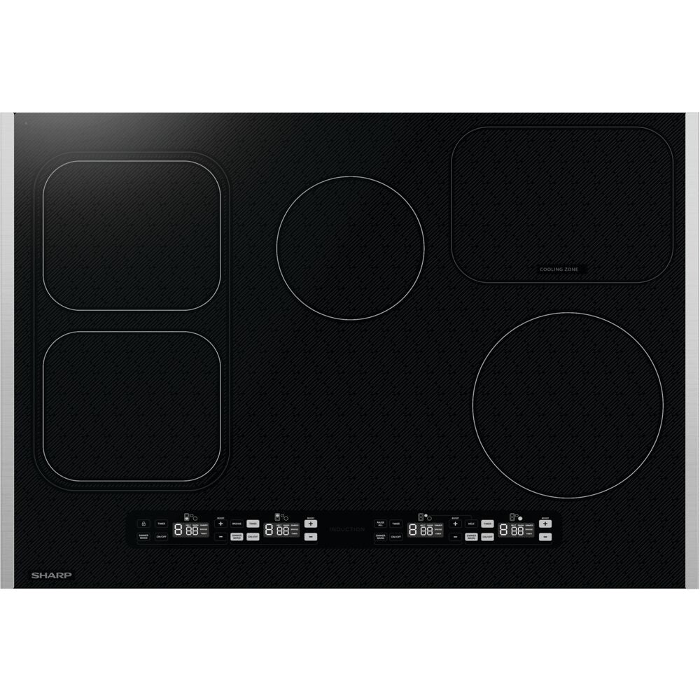 Black glass induction cooktop with four heating zones and digital touch controls in kitchen appliances collection
