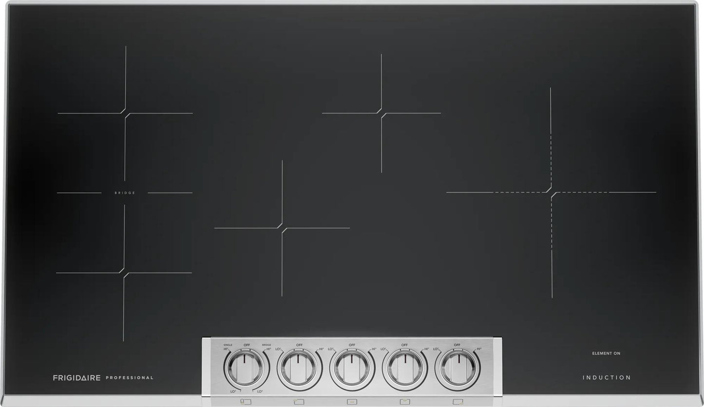 Black induction cooktop with five stainless steel control knobs in appliances and kitchenware collection
