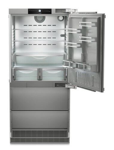 Open built-in stainless steel refrigerator with adjustable shelves, clear crisper drawers, and bottom freezer in Appliances collection