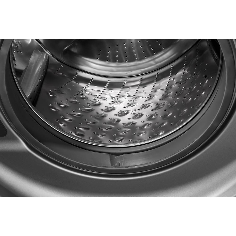 Close-up of stainless steel interior drum inside front load washer in Washers & Dryers and Appliances collections