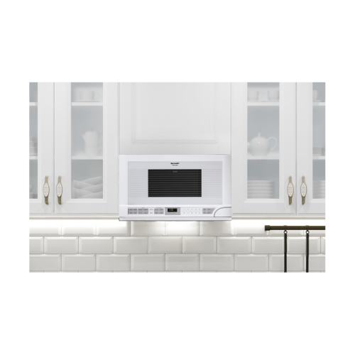 White over-the-counter microwave with sensor controls, digital display, and white cabinetry in kitchen appliances collection
