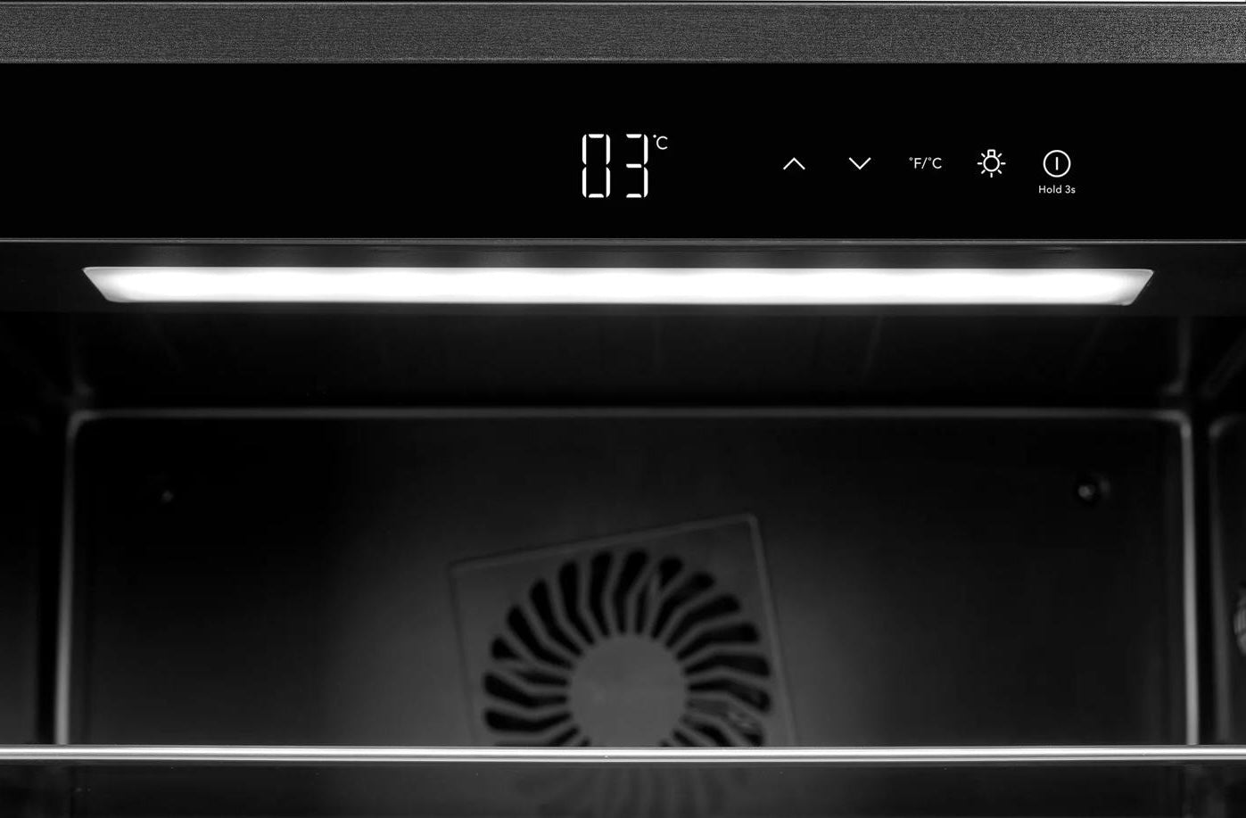 Interior view of a beverage center showing digital temperature display, control panel, LED lighting, and cooling fan, featured in Refrigerators, Kitchen & Kitchenware, Beverage Centers, and Appliances collections.