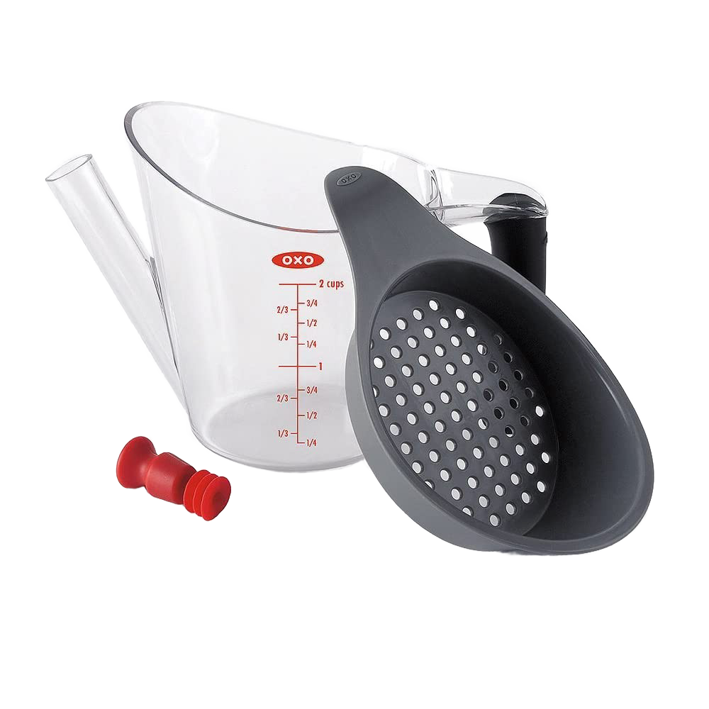 Clear OXO fat separator with gray strainer, red stopper, and measurement markings for Kitchen Gadgets and Kitchenware collections