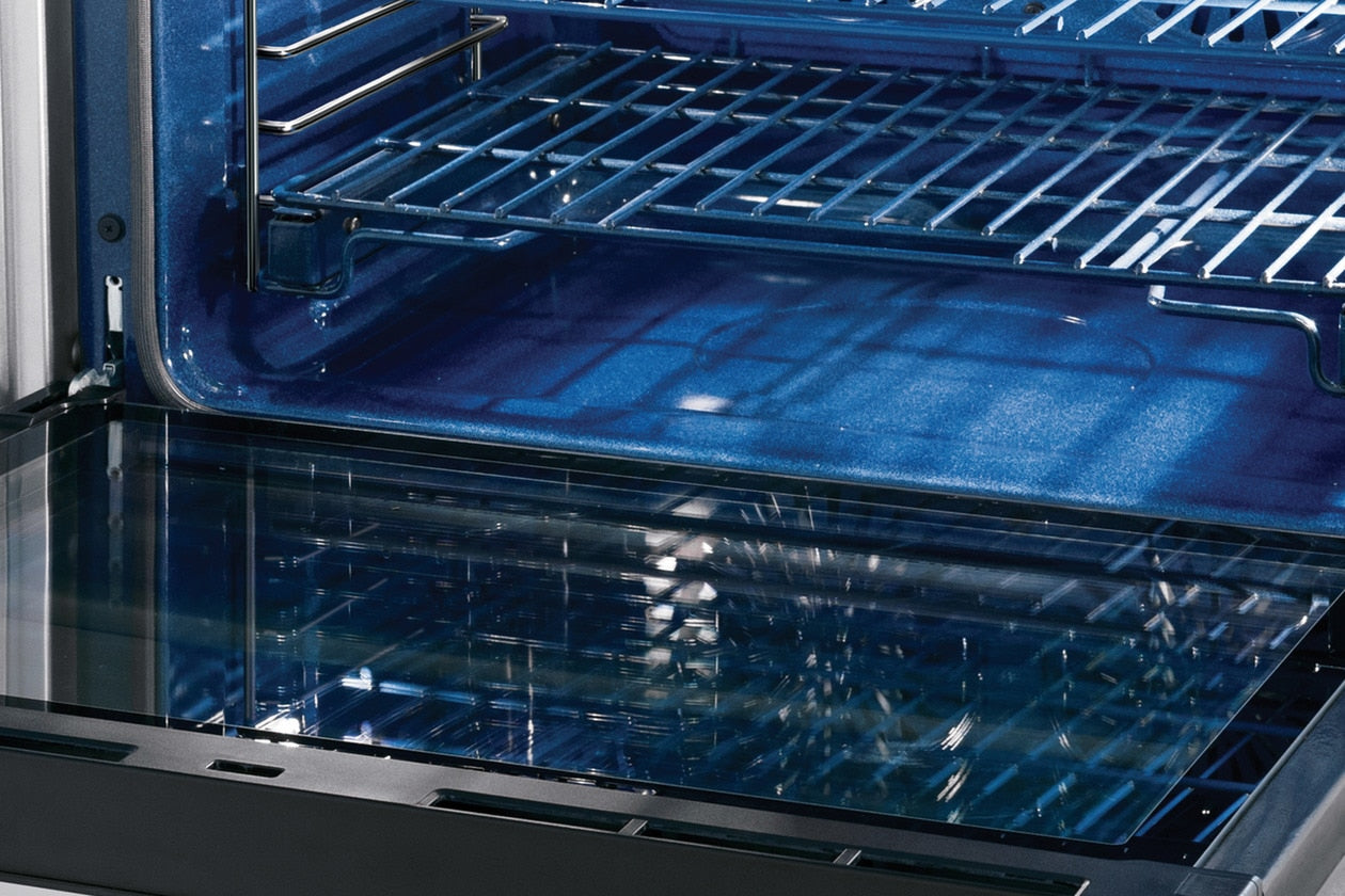 Open double wall oven with blue interior and Luxury-Glide® racks from Kitchen & Kitchenware appliances collection