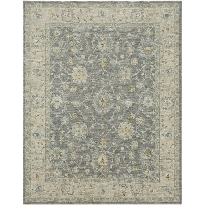 Dark gray area rug with ornate floral and vine patterns in taupe and gold tones for home decor and improvement.