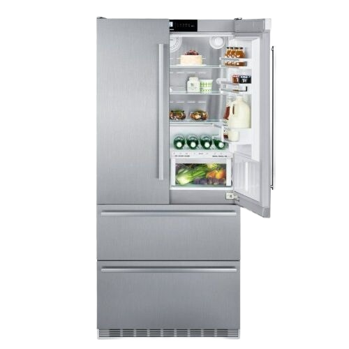 Stainless steel freestanding French door refrigerator with bottom freezer drawers and interior shelves in kitchen appliances collection