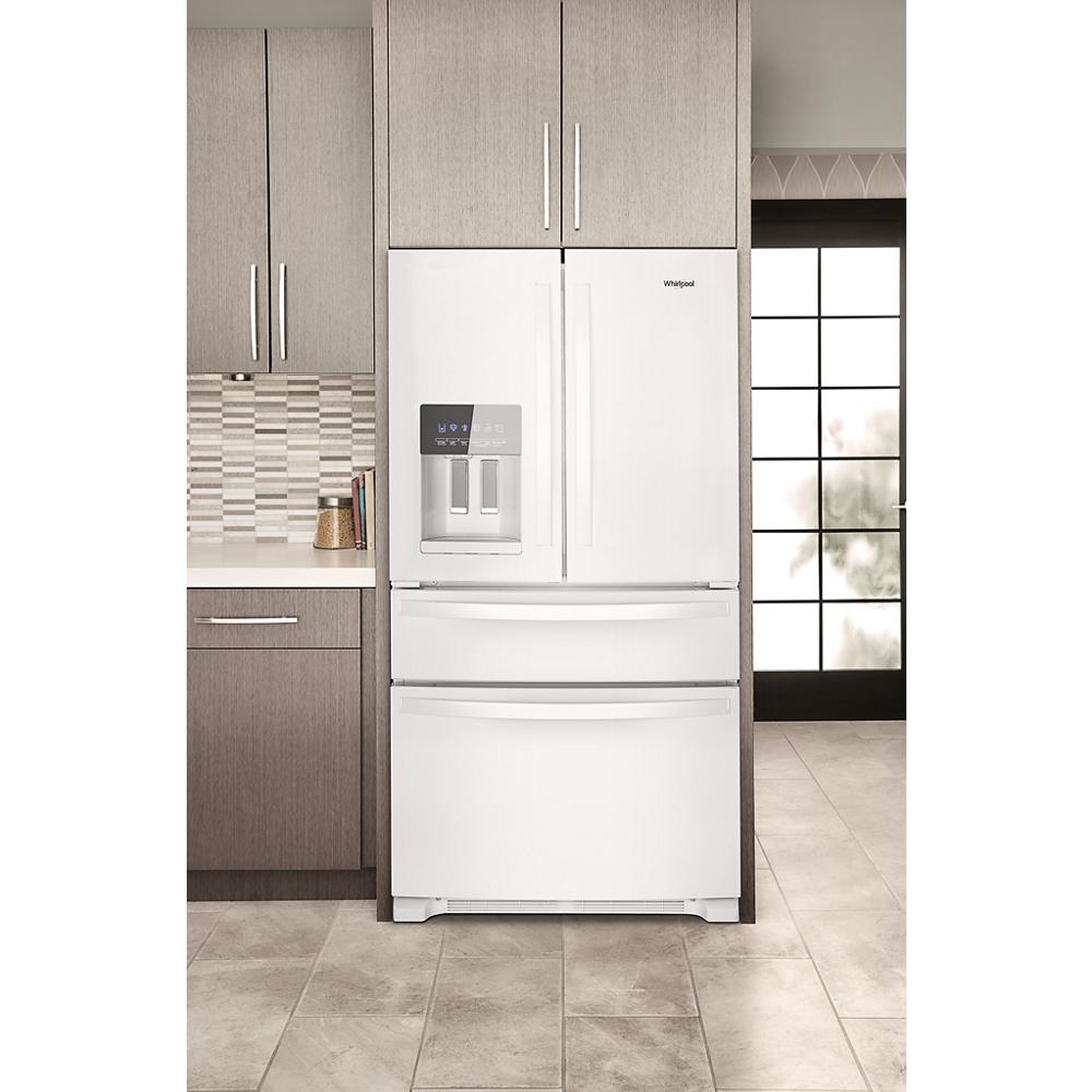 36-inch wide white French door refrigerator with bottom drawers and exterior water dispenser in kitchen appliances collection