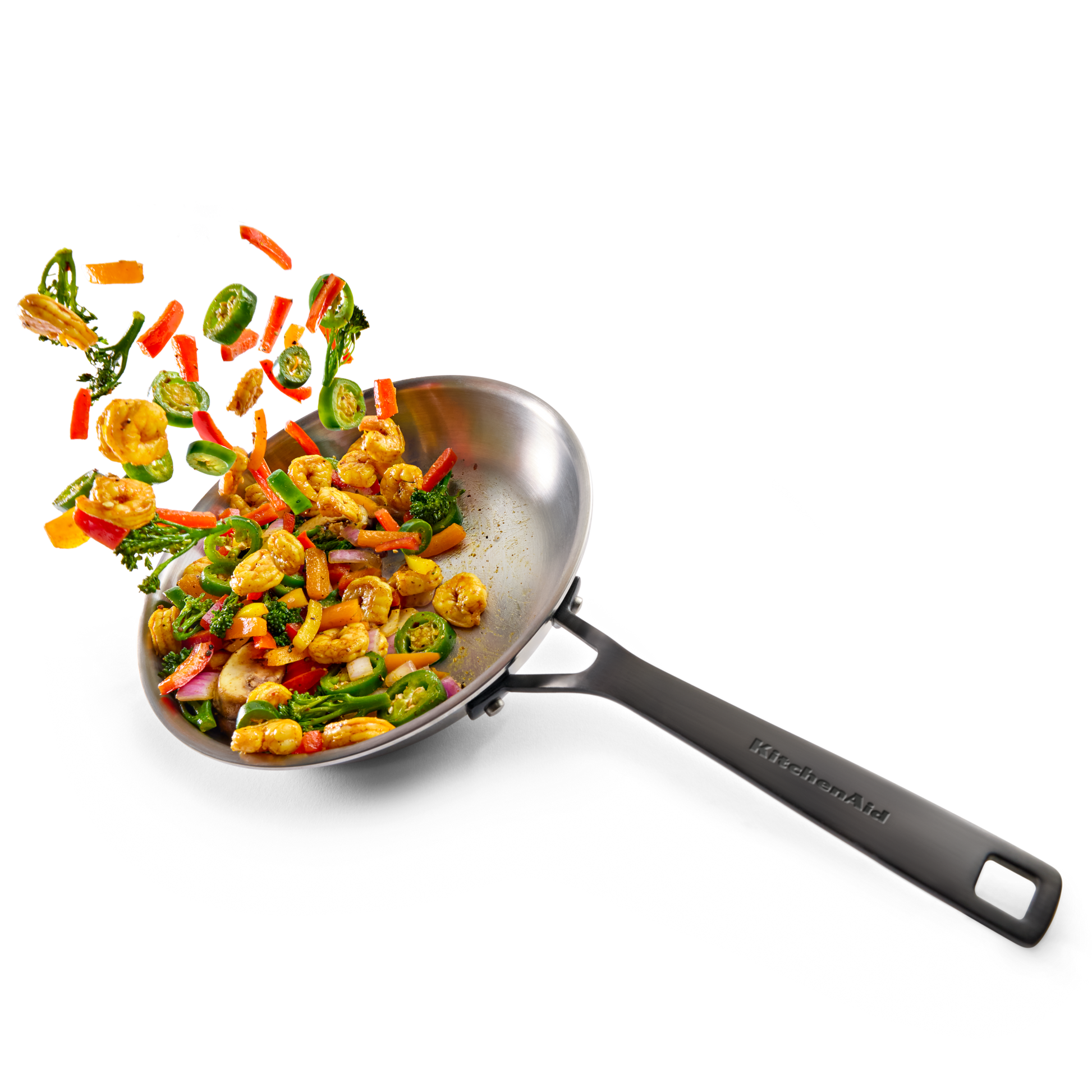 Stainless steel wok with shrimp and vegetables tossed mid-air, highlighting kitchenware for home improvement tools.
