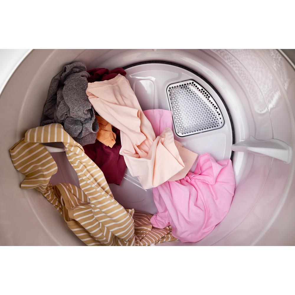 Front load smart electric dryer drum with assorted clothes inside for efficient home laundry in Dryers collection