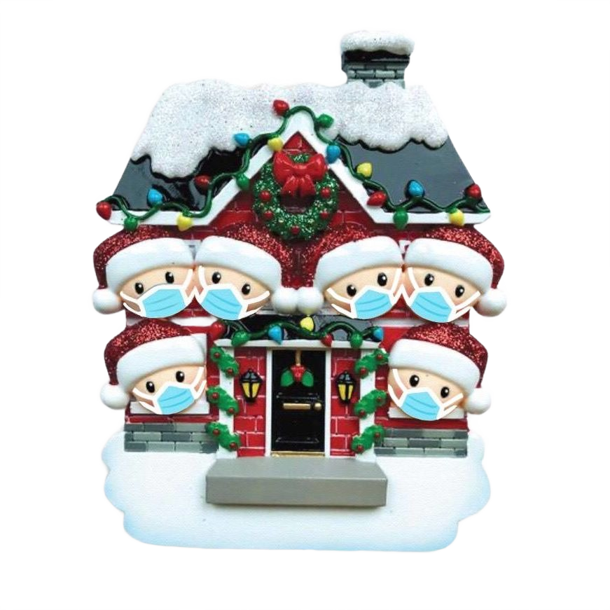 Holiday house ornament with six masked family members and festive decorations in Christmas tree collection under $50