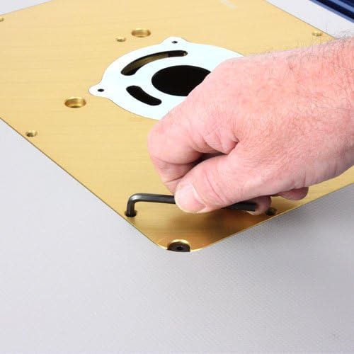 Hand tightening brass router plate screws with hex key on CNC machined adapter for woodworking tools under $100 collections
