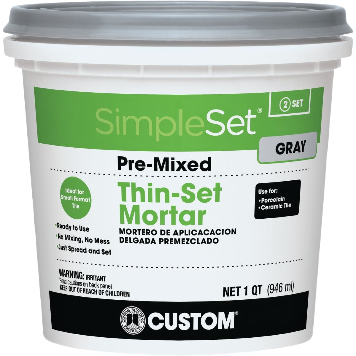 Gray pre-mixed thin-set mortar in plastic container for setting porcelain and ceramic tile in home improvement projects
