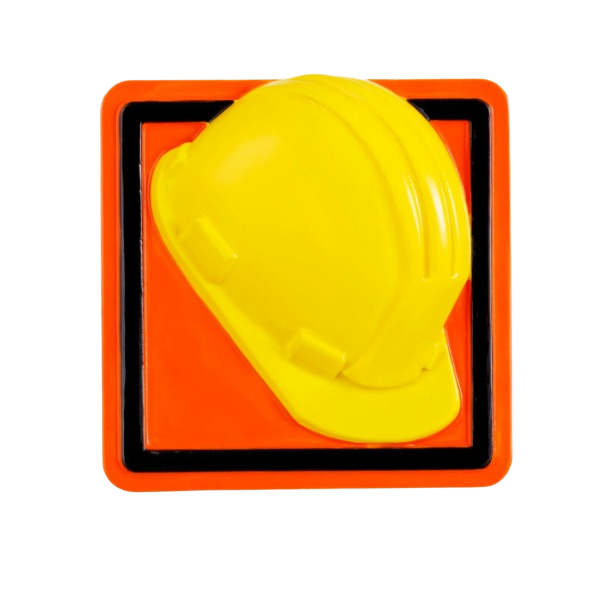Bright yellow hard hat ornament on neon orange road sign base for Christmas decor under 50 dollars collection.