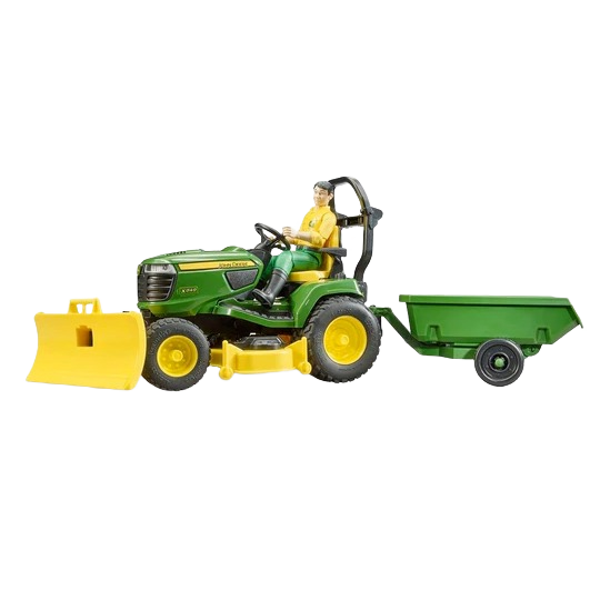 Green and yellow lawn tractor toy with driver figure and attached green trailer, part of outdoor power equipment and toys collections