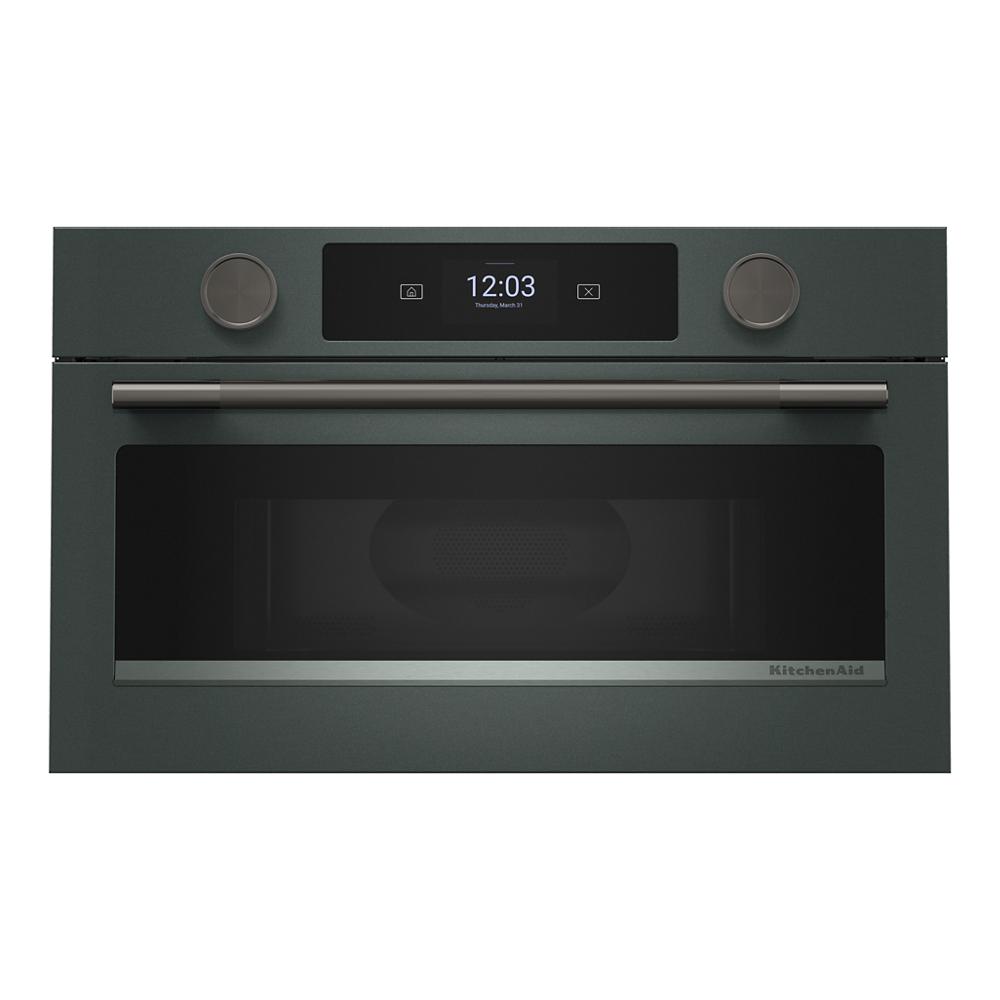 Built-in matte black microwave oven with digital display, dual control knobs, and stainless steel handle from KitchenAid Appliances collection