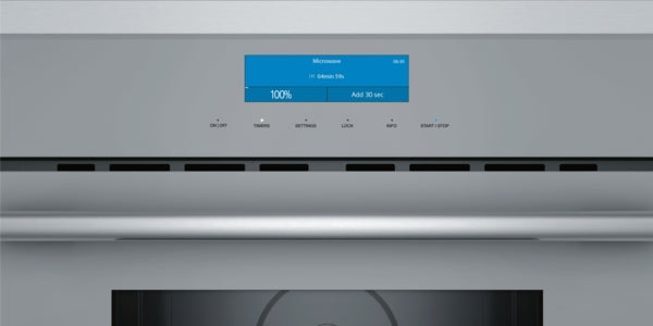 Built-in stainless steel microwave control panel with blue TFT display and glass touch buttons in kitchen appliances collection