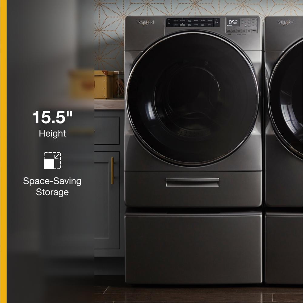 Front load washer and dryer in metallic finish elevated on matching pedestals offering space-saving storage in appliances collection