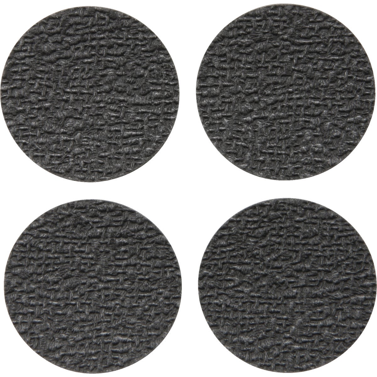Set of four round dark gray non-skid furniture pads with textured surface for protecting floors and improving grip