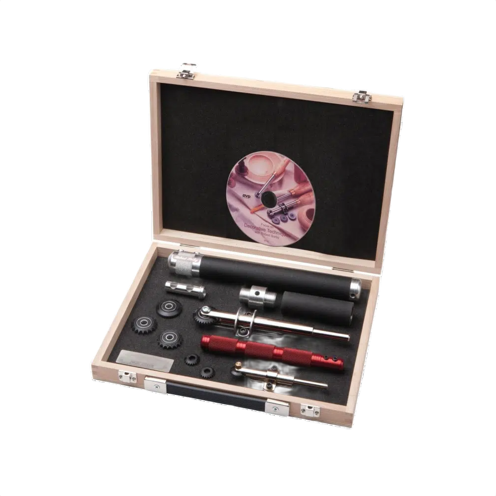 Compact woodturning spiralling and texturing tool set with multiple wheel attachments in protective wooden case for woodworking tools collection