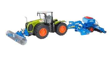 Green and black tractor toy attached to blue front furrow press model for home improvement tools and farming decor