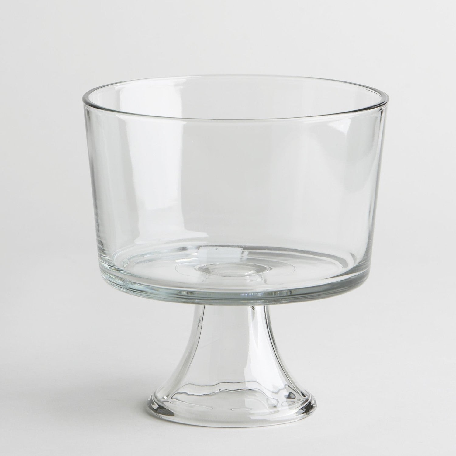 Clear glass footed trifle bowl with wide opening, ideal for serving desserts or salads in kitchenware collections.