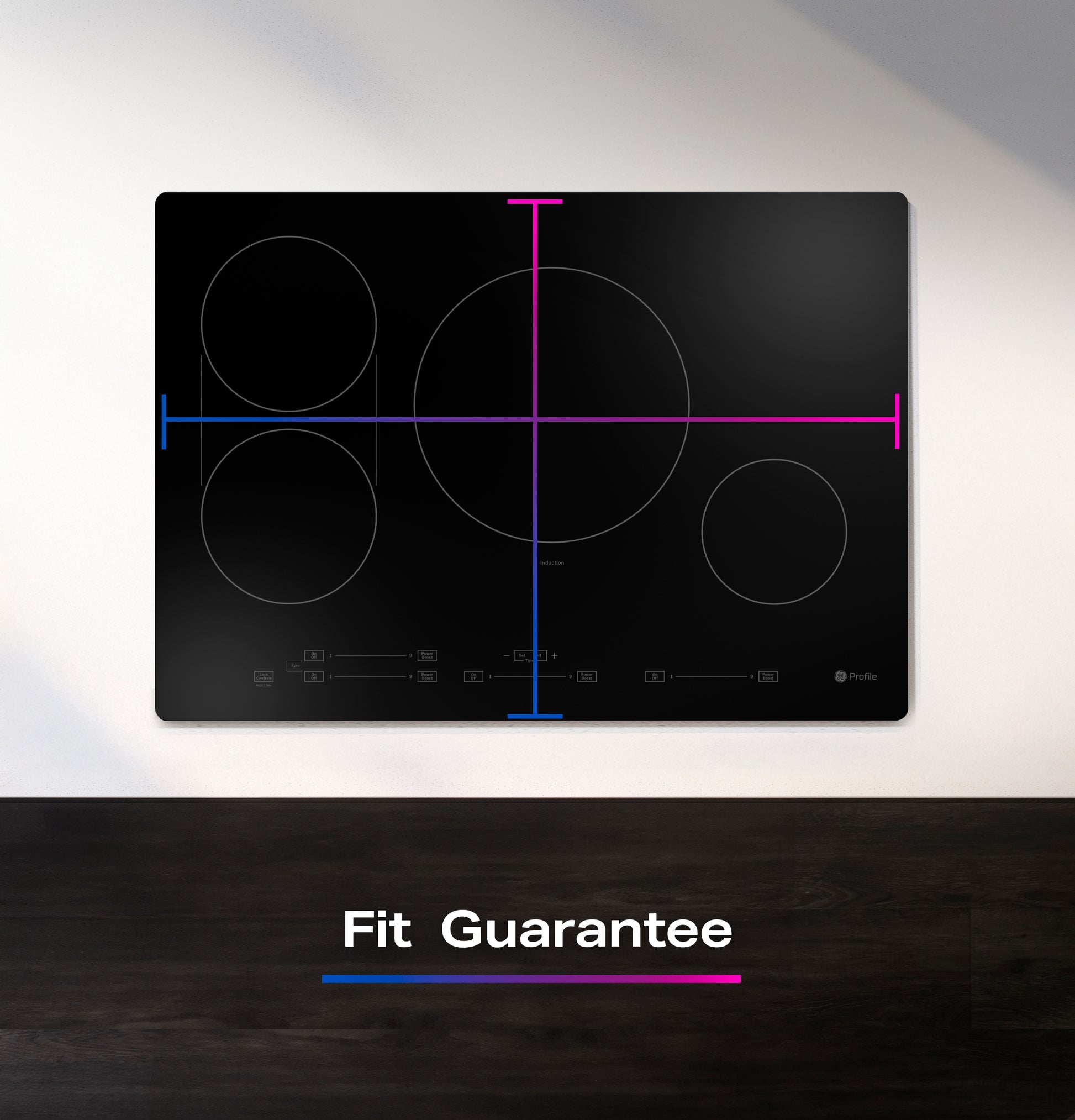 Black built-in induction cooktop with touch controls mounted above dark wood surface in modern kitchen setting