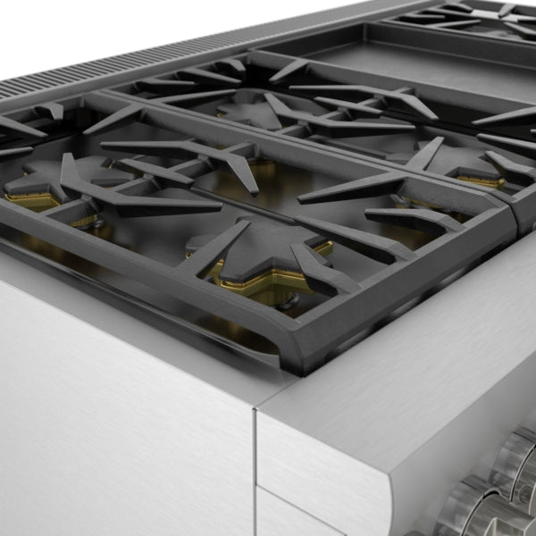 Close-up of stainless steel stove top with cast-aluminum burner grates and powerful dual fuel burners from Ranges collection
