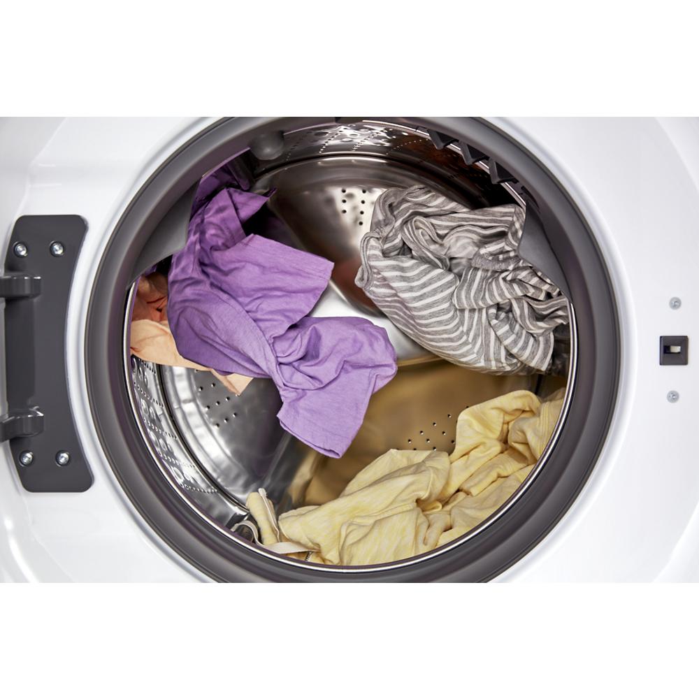 Open door view of mixed colored laundry inside a ventless washer dryer combo drum in washer/dryer collection