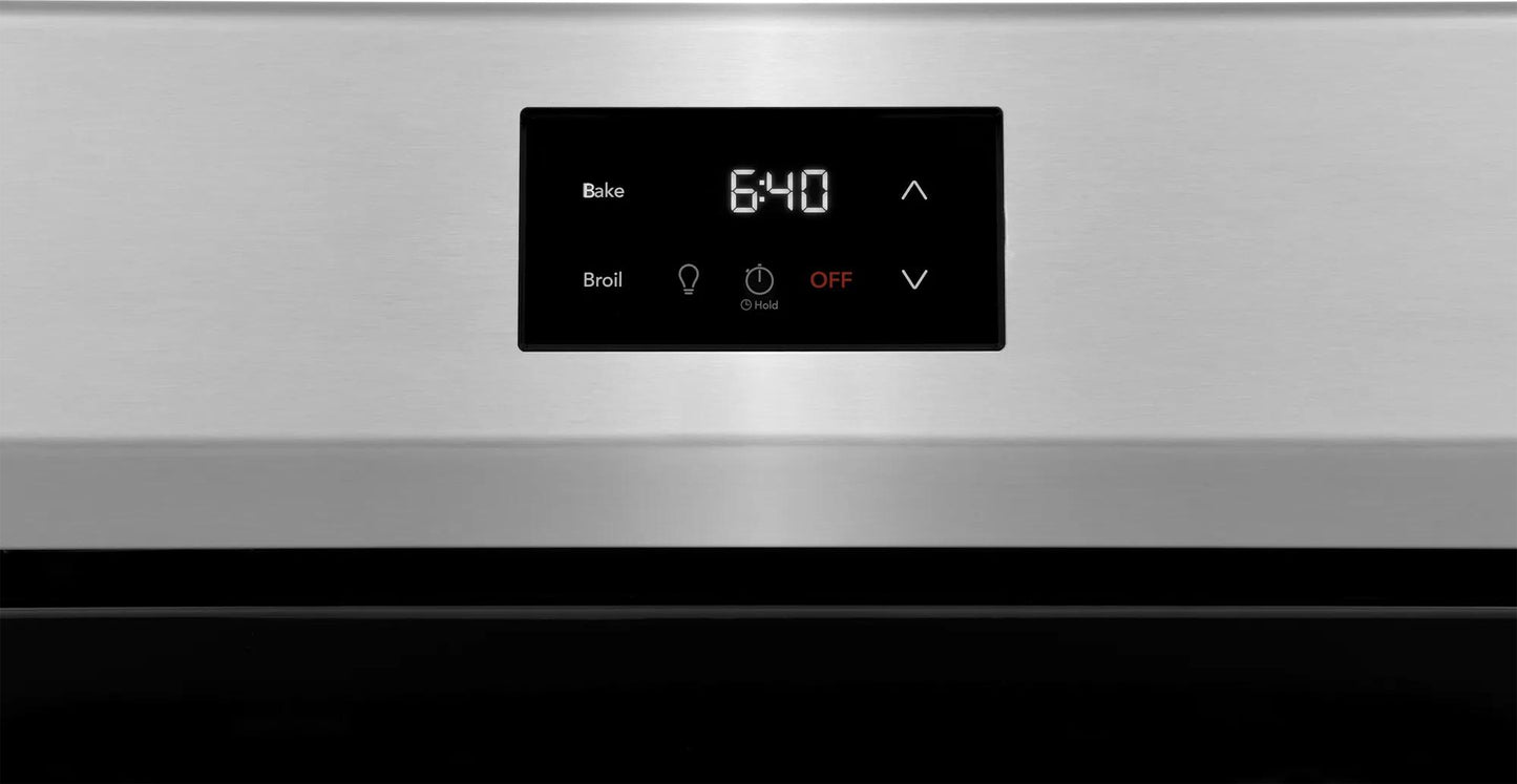 Close-up of digital control panel with bake and broil settings on stainless steel electric range in kitchen appliances collection