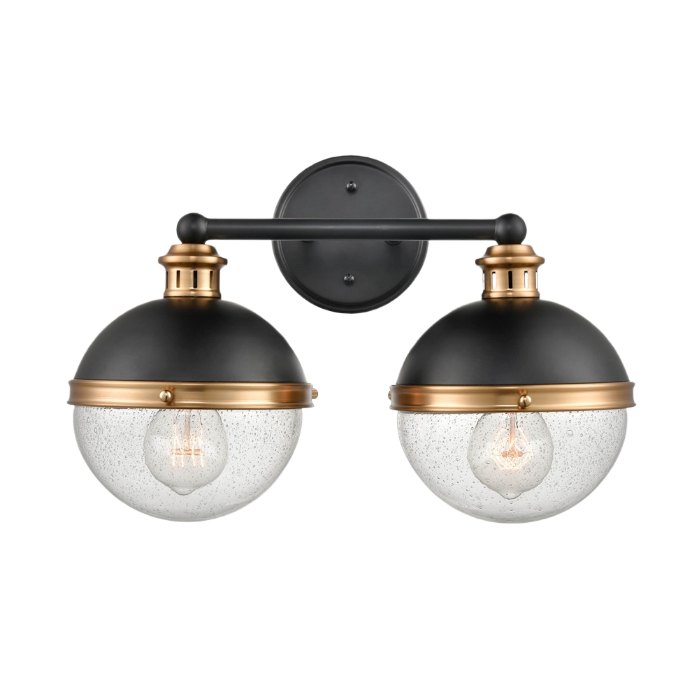 Matte black and aged brass two-light vanity fixture with clear seeded glass shades for bathroom lighting collections