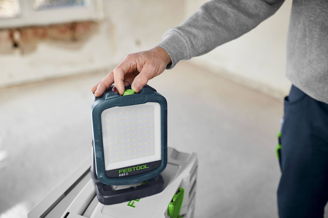 Compact cordless Festool Syslite work light with sturdy handle and bright LED panel for home improvement and tools collections