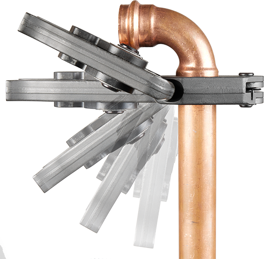 Black pivoting press rings aligned on copper pipe elbow demonstrating tool adjustment for plumbing and home improvement tasks