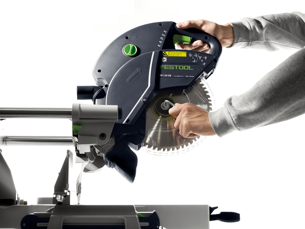 Person adjusting the blade on Festool sliding compound miter saw in Power Tools and Saws collections