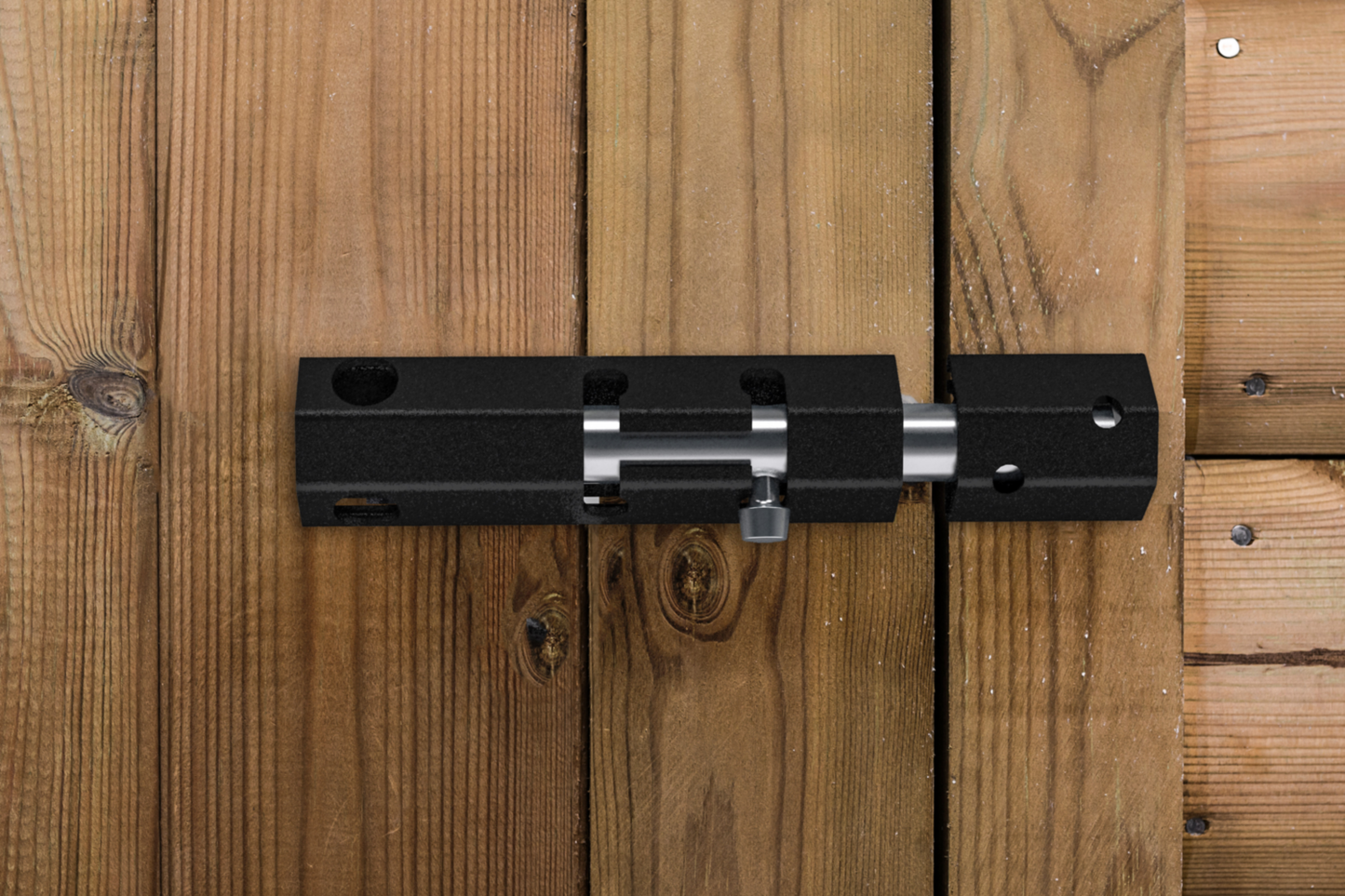 Black lockable security bolt with metal construction installed on wooden gate for door and gate hardware under $50 in home improvement tools