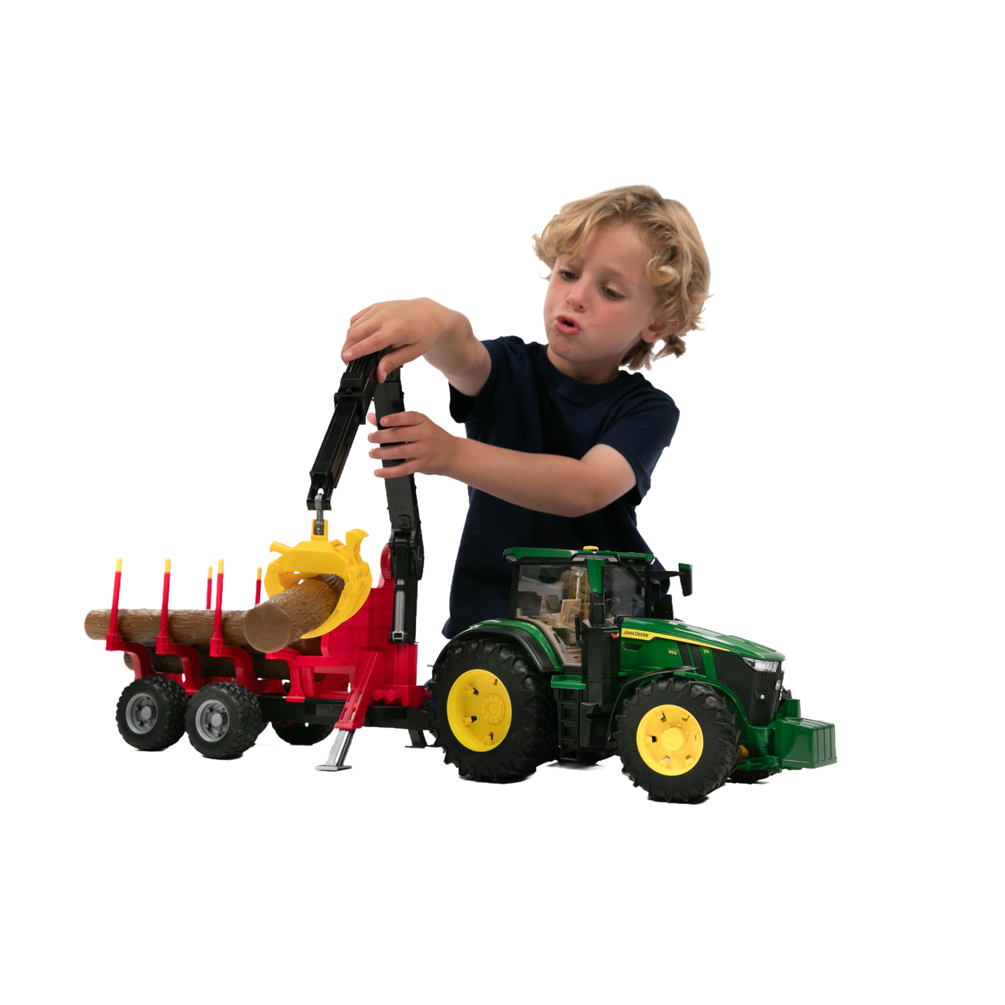 Child playing with green and yellow Bruder John Deere tractor toy and red forestry trailer in Vehicles & Remote Controlled Toys collection