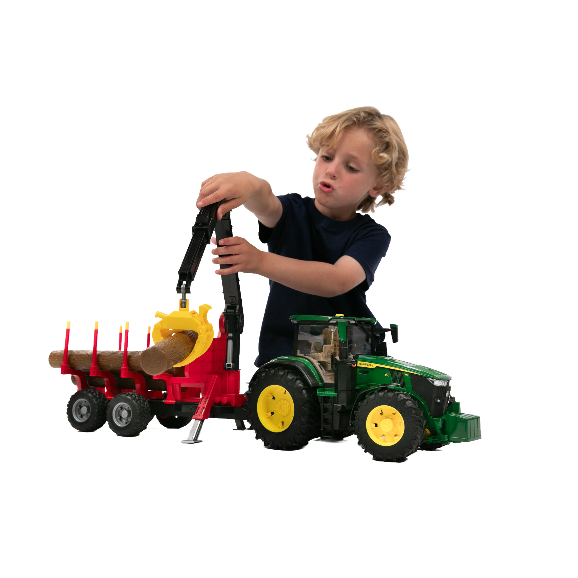Child playing with green and yellow Bruder John Deere tractor toy and red forestry trailer in Vehicles & Remote Controlled Toys collection
