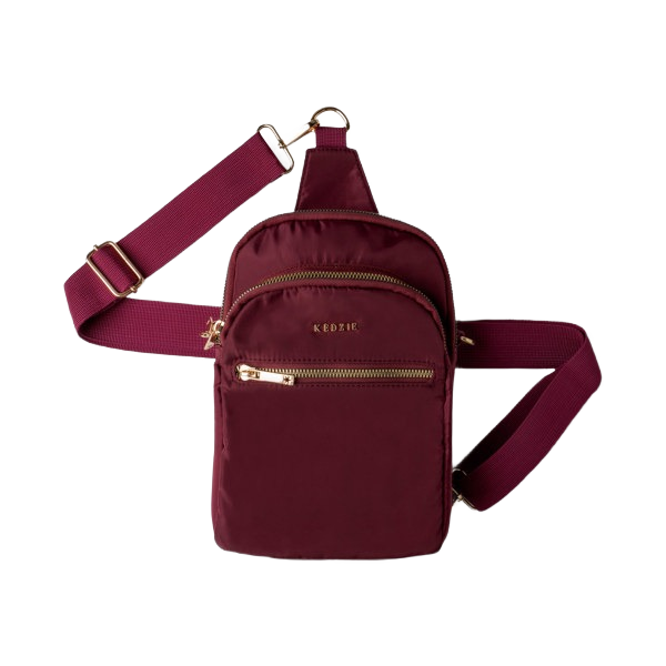 Compact maroon fabric sling bag with two zippered front pockets and adjustable strap, part of Clothing & Shoes, Accessories, Bags & Wallets collections at Hartville Hardware.