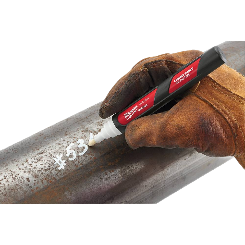 Milwaukee white liquid paint marker with acrylic nib marking metal pipe, part of Hand Tools and Woodworking collections.