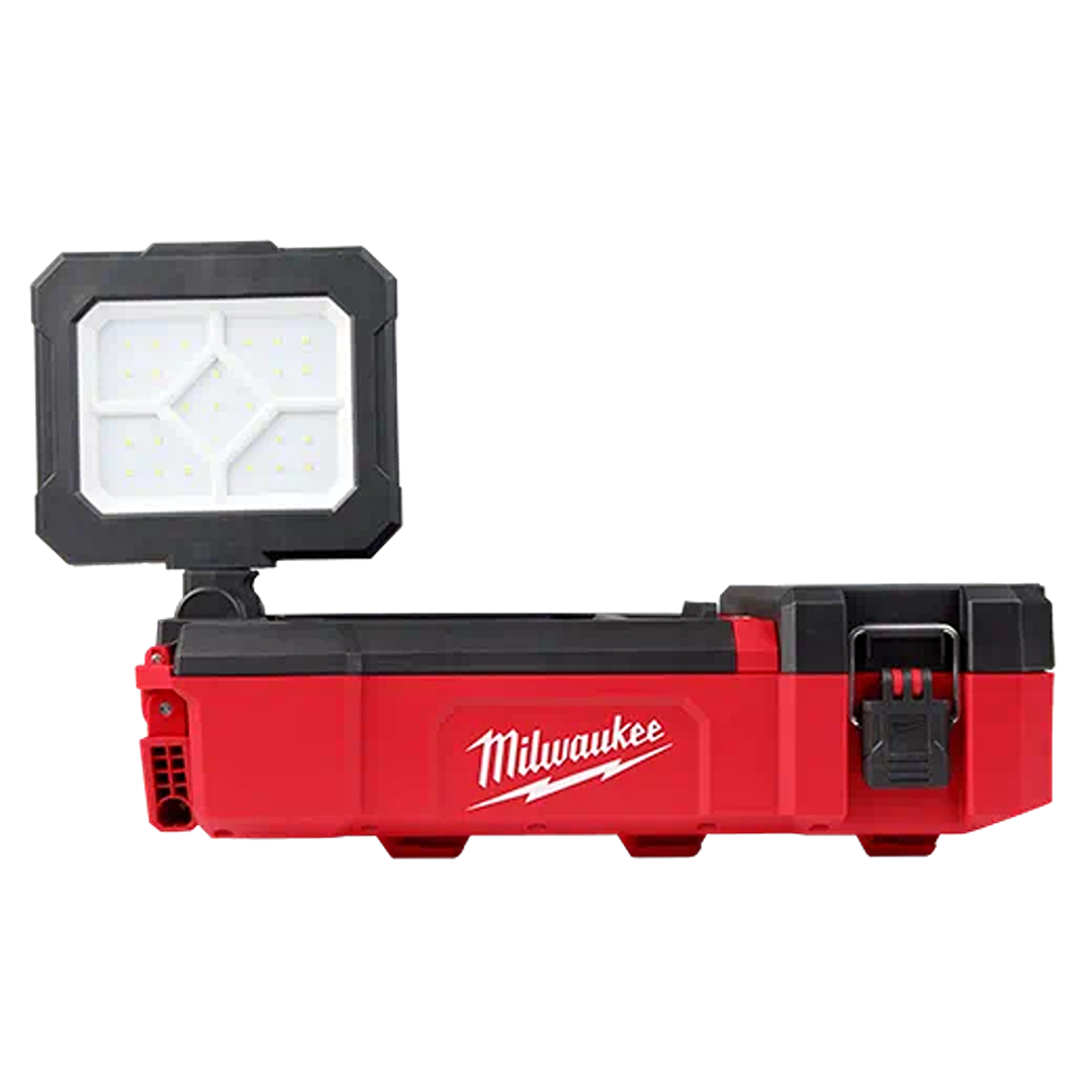 Compact red and black Milwaukee work light with adjustable LED floodlight and integrated USB charging port for tools and jobsite use